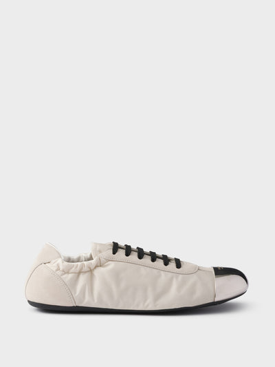 Prada Collapse Re-Nylon and suede sneakers with metal toecap at Collagerie