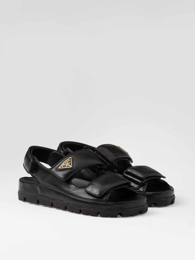 Prada Flat nappa leather sandals at Collagerie