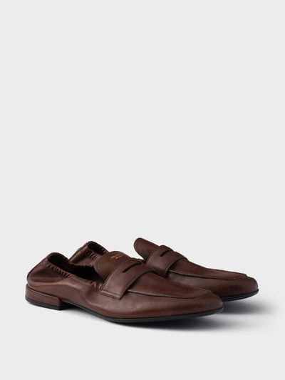 Prada Shuffle antiqued leather loafers at Collagerie