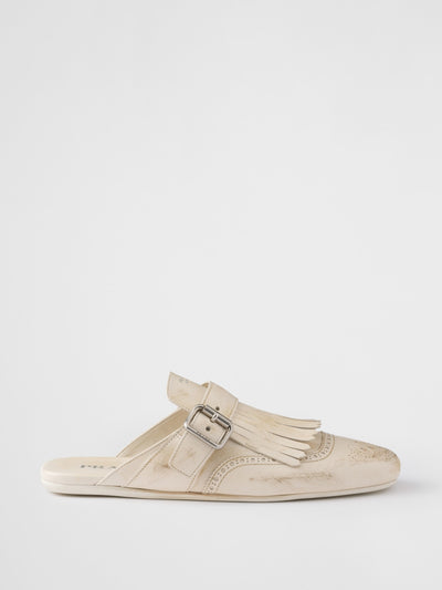 Prada Shuffle fringed leather mules at Collagerie