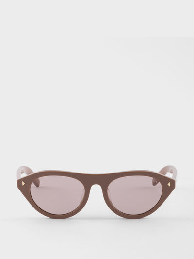Prada Prada sunglasses with the iconic metal plaque at Collagerie