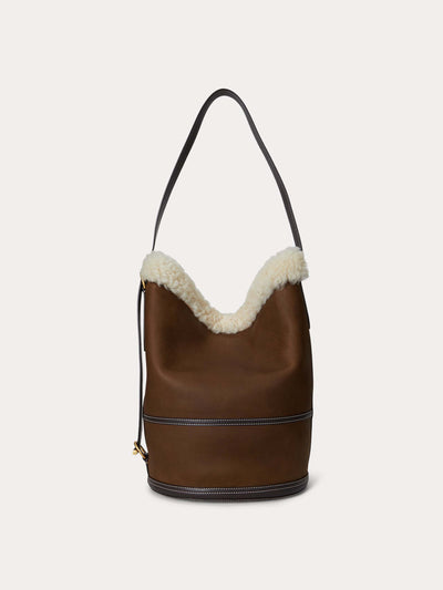 Polo Ralph Lauren Bellport shearling sling bucket bag at Collagerie