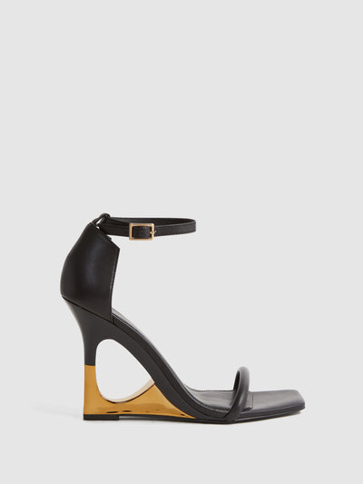 reiss Black and gold strappy leather wedge sandals at Collagerie