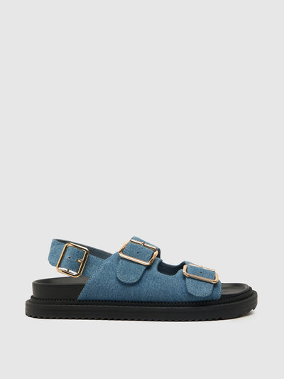 Schuh Talbot double buckle sandals in blue at Collagerie