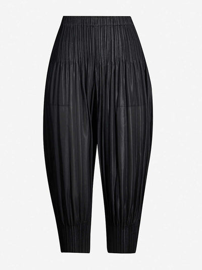 Issey Miyake Black pleated jersey trousers at Collagerie