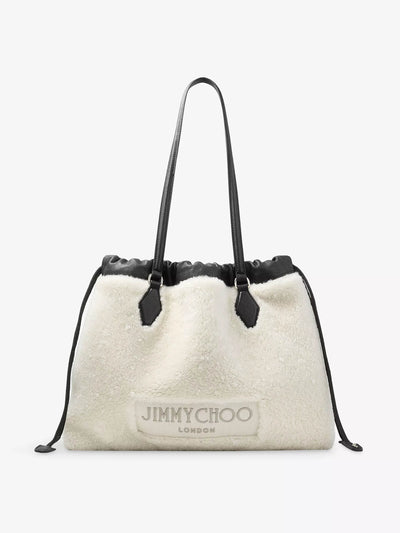 Jimmy Choo Drawstring shearling tote bag at Collagerie
