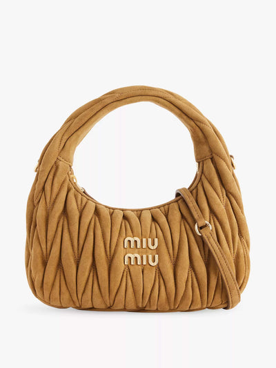Miu Miu Wander matelassé suede top handle bag at Collagerie
