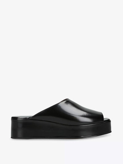 The Row Emi leather flatform sandals at Collagerie