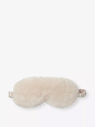 The White Company Elasticated faux-shearling eye mask at Collagerie