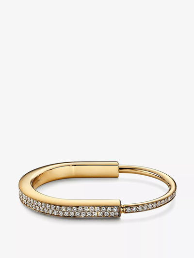 Tiffany & Co Lock 18kt yellow-gold and diamond bangle bracelet at Collagerie