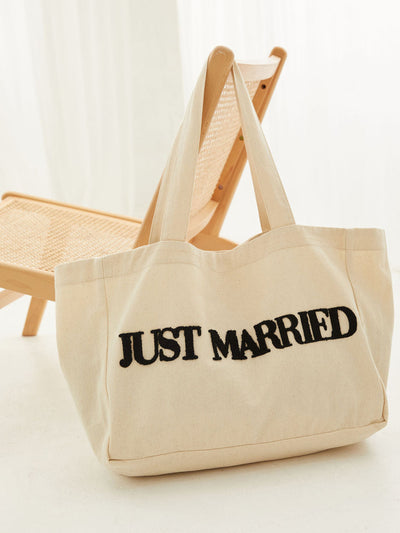 Six Stories Just Married tote bag at Collagerie