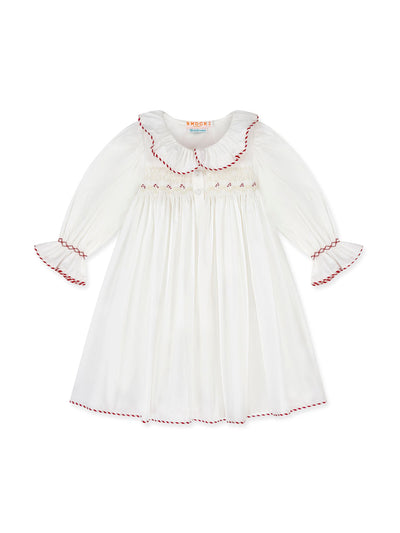 Smock London Nightingale girl’s dress with candy cane hand smocking at Collagerie