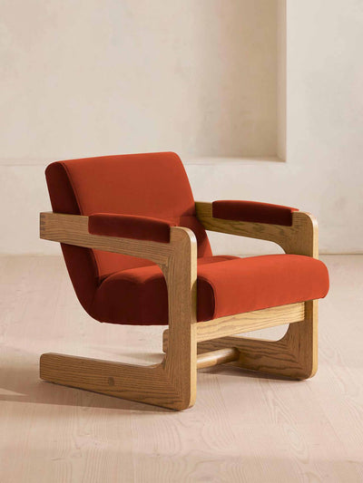 Soho Home Red velvet armchair at Collagerie