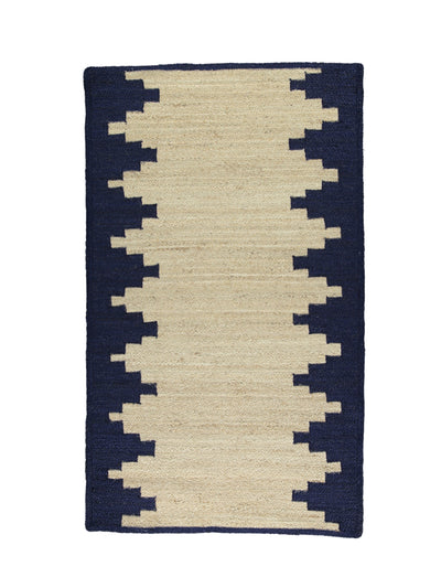 The Braided Rug Company Natural jute Aztec navy rug at Collagerie