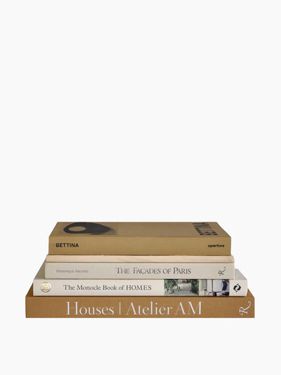 Maison Place The beige coffee table book stack at Collagerie