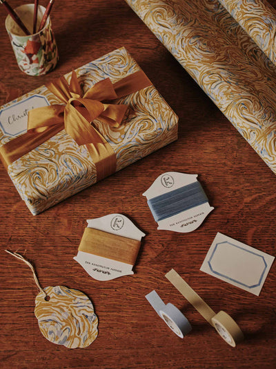 The Kensignton Paperie Wrapping kit box in Marble Mustard at Collagerie