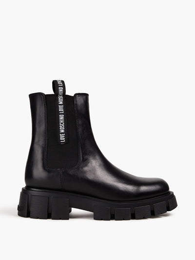 Love Moschino Logo-appliquéd leather Chelsea boots at Collagerie