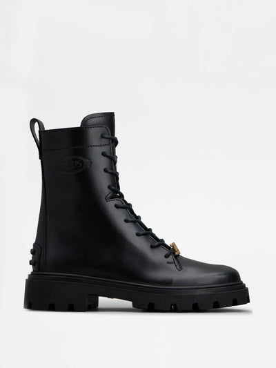 Tods Black leather combat boots at Collagerie