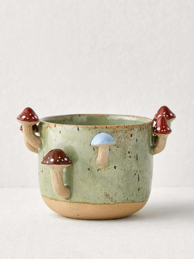 Urban Outfitters Sprouting mushroom planter at Collagerie