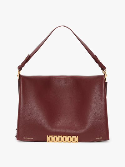 Victoria Beckham Jumbo chain pouch in burgundy at Collagerie