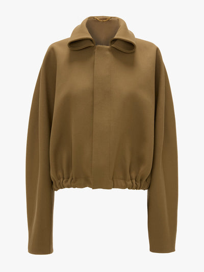 Victoria Beckham Oversized roll neck bomber jacket in dark camel at Collagerie