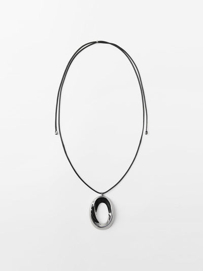 Zara Cord necklace with circular pendant at Collagerie