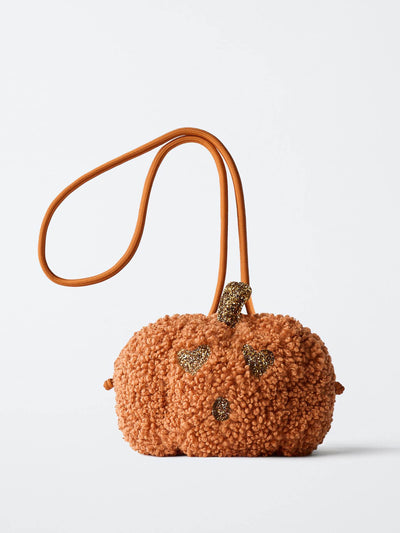 Zara Faux shearling pumpkin crossbody bag at Collagerie