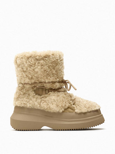 Zara Flat faux shearling ankle boots at Collagerie