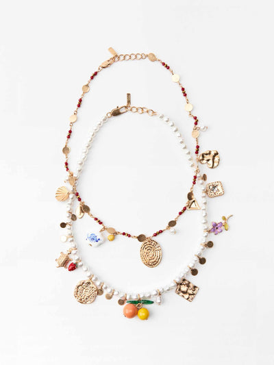 Zara Pack of faux pearl and beaded necklaces with charms at Collagerie