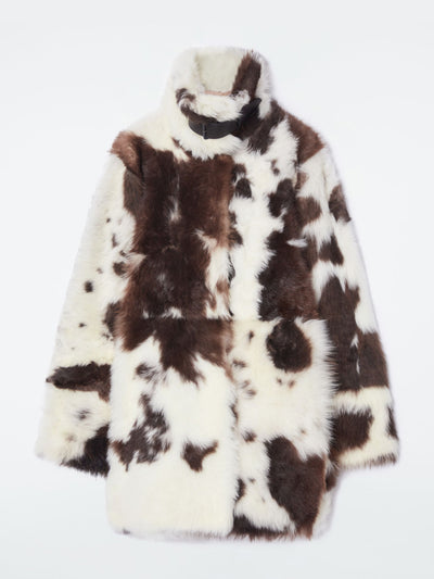 Cos The funnel-neck shearling coat at Collagerie