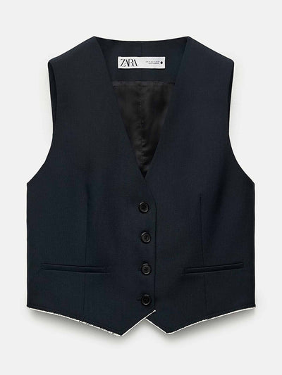 Zara Minimalist waistcoat with trim at Collagerie