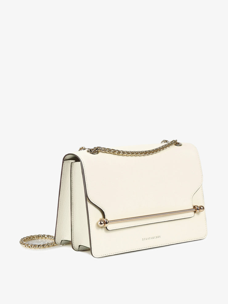 This Strathberry shoulder bag is an effortlessly elegant style for both day and evening wear, defined by a structured silhouette and shoulder chain. Collagerie.com