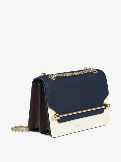 Strathberry Navy and white East/West Mini shoulder bag at Collagerie