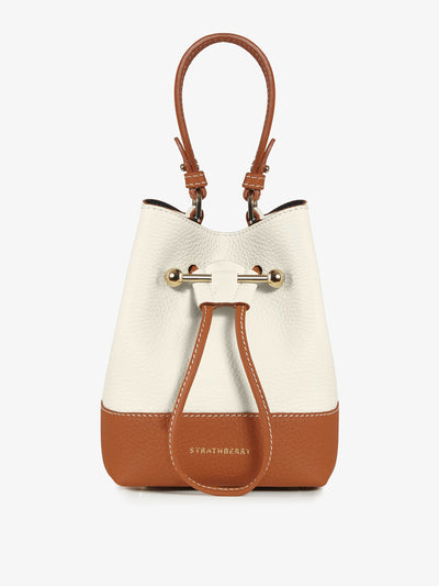 Strathberry Vanilla and tan Lana Osette bucket bag at Collagerie
