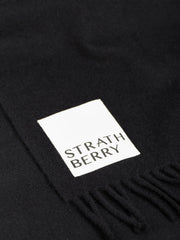 An enduring classic, this Strathberry scarf will fit seamlessly into your winter wardrobe. Collagerie.com