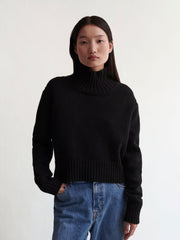 &Daughter's Fintra Knit in soft and warm 4-ply black lambswool is a timeless piece. Collagerie.com