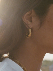 Gold selva oscura earrings