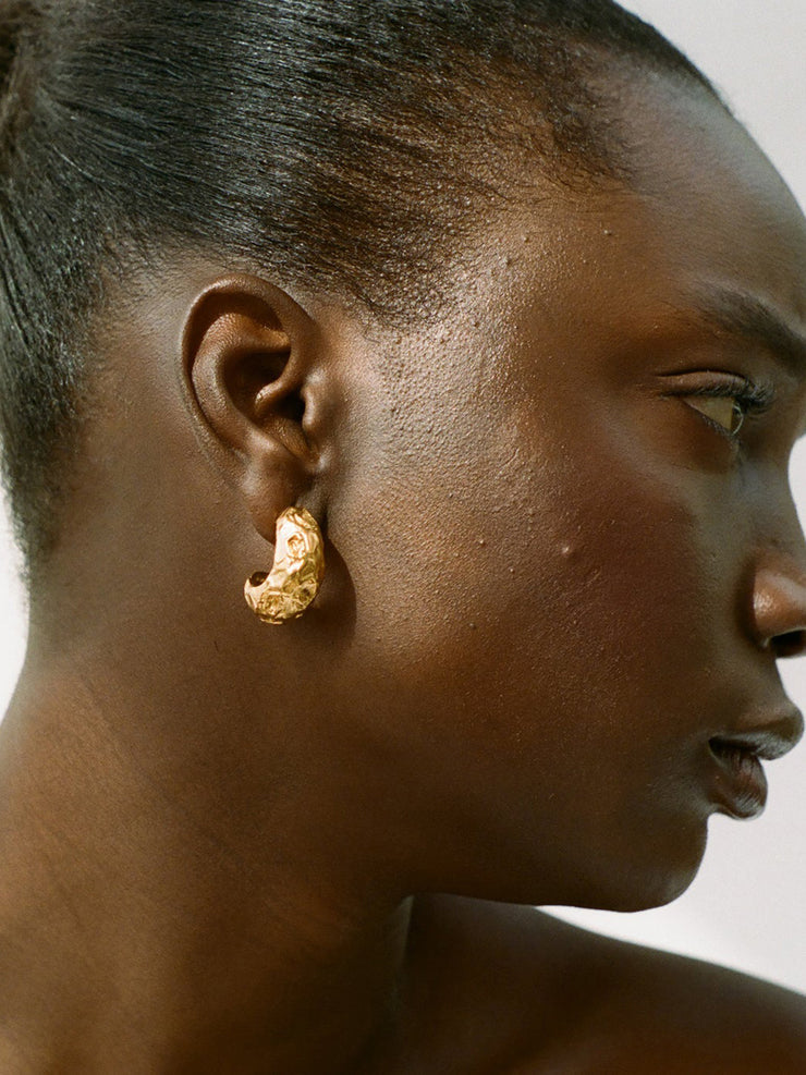Gold fragmented amulet hoop earrings