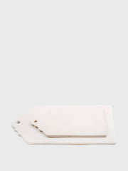 Inspired by the architectural silhouettes of the gables of Montagu, South Africa, these  Hadeda ceramic cheese boards are perfect in their artisan, minimal design. Collagerie.com