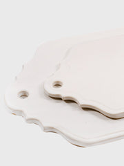 Inspired by the architectural silhouettes of the gables of Montagu, South Africa, these Hadeda ceramic cheese boards are perfect in their artisan, minimal design.  Collagerie.com