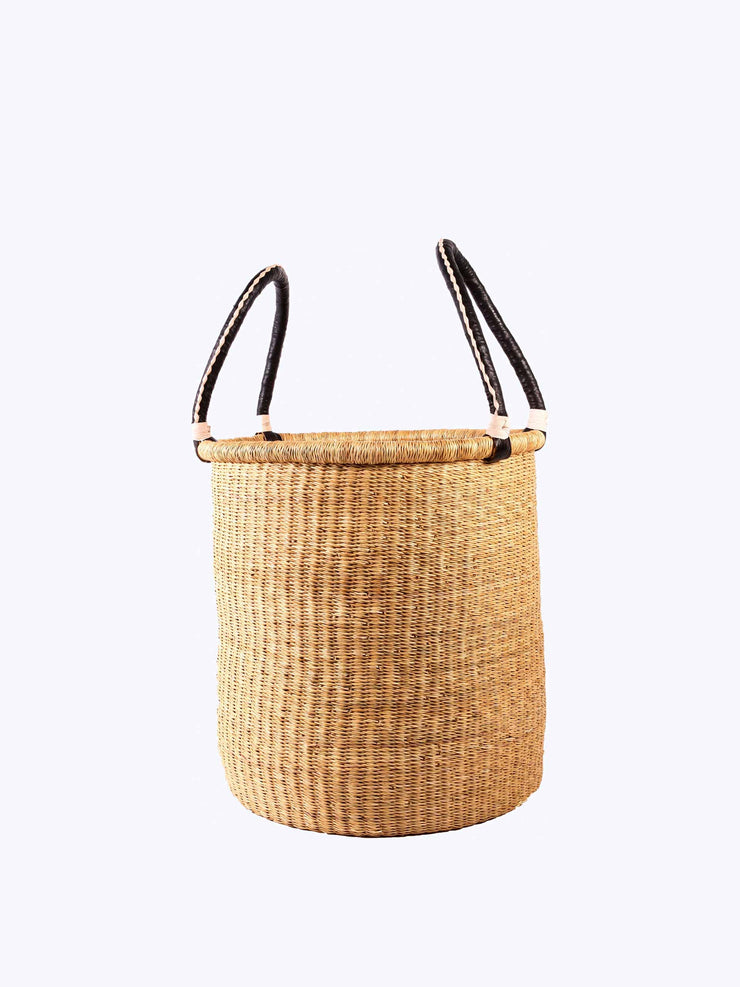 Large laundry basket in natural