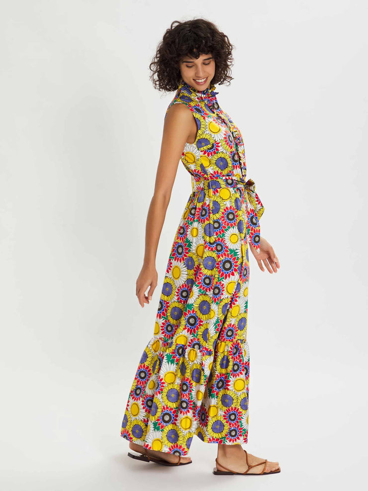 Brooke multi coloured cotton summer maxi dress with sunflower print by Borgo de Nor. Dress has a buttoned front and a high neck with belt | Collagerie.com