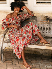 Beautiful hand-blocked fabric off shoulder dress by Rae Feather. Brown, orange and red dress perfect for the Summer and holiday | Collagerie.com