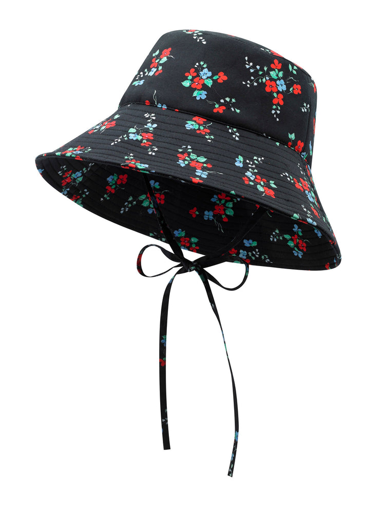 YOLKE’s blossom printed 100% Cotton bucket hat is the perfect summer accessory. Scattered with blossoms and features side straps that can be tied | Collagerie.com