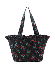 Petite black bucket bag with poppy red, green blue blossoms by Yolke. Cut from 100% cotton. Perfect errand and weekend bag | Collagerie.com