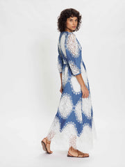 Constance white lace and blue denim lace midi dress by Borgo de Nor. With its luxe white lace details, it is a party dress or a perfect summer dress | Collagerie.com