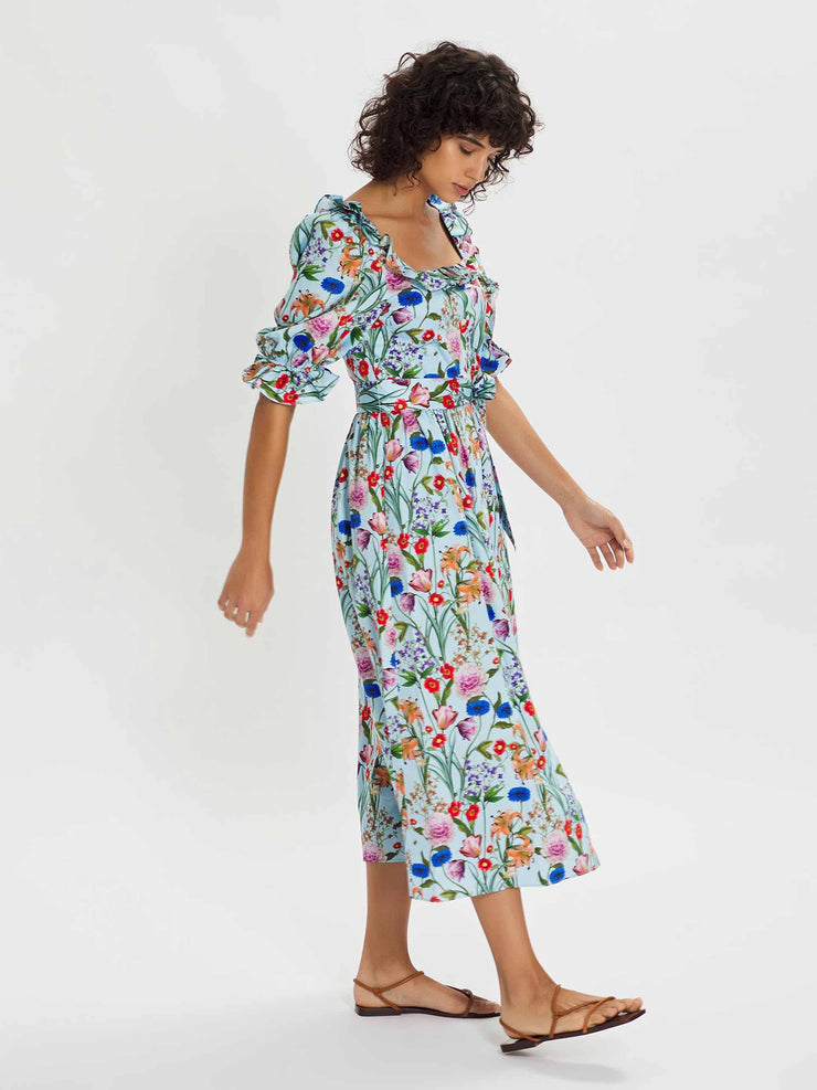 Corina blue multi coloured floral midi dress by Borgo de Nor. A ruffled square neckline, elegantly puffed sleeves and adjustable belt | Collagerie.com