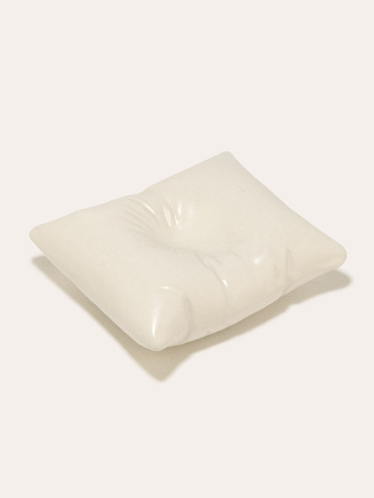 "Bumped" ceramic cushion in matte white