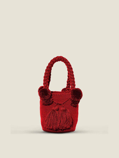 The Colombia Collective Small pom pom bag at Collagerie