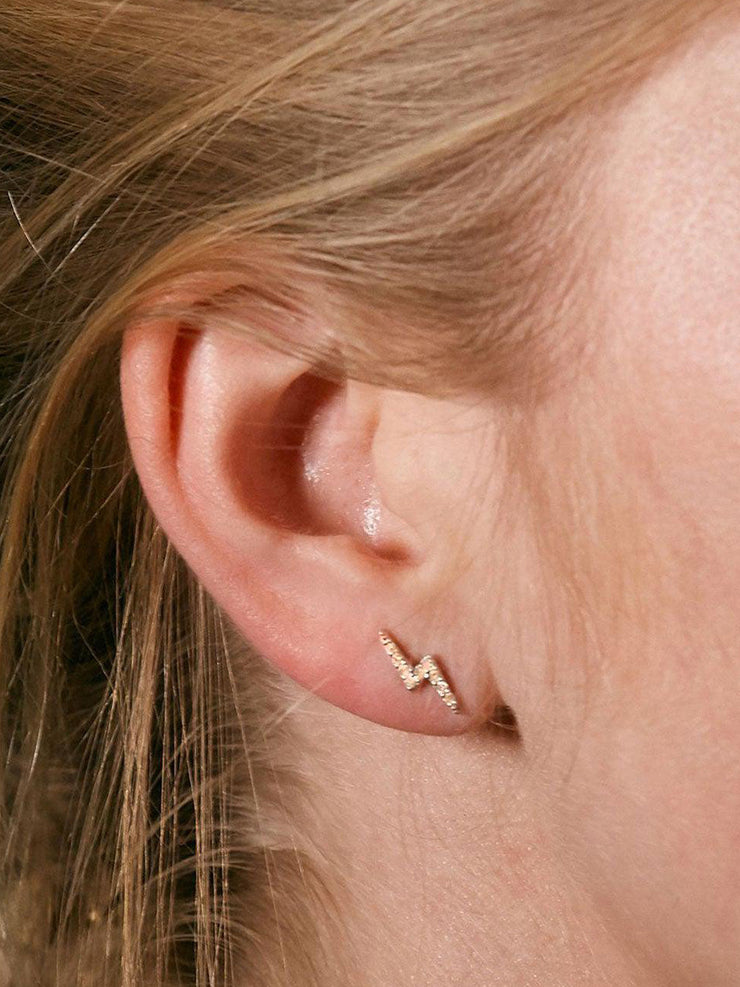 Diamond and silver lightning bolt stud earrings